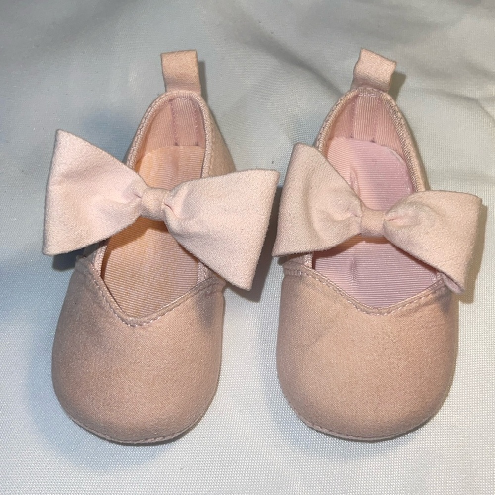 Delicate pink suede infant shoes with bows from Nordstrom, never worn